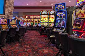 Filipino high volume bettor reviewing jbet88 high roller limits on smartphone